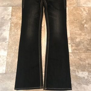 Rock Revivals dark wash jeans
